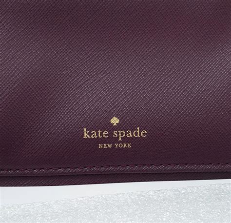 kate spade laurel way talla wallet fake